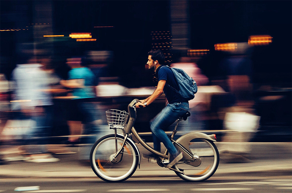 Man Riding on Bicycle